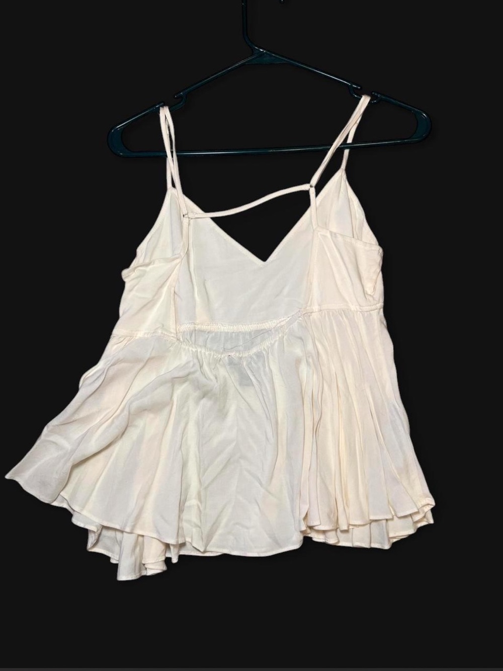 Cream flowy peplum tank top